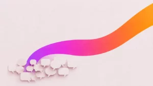 Gradient ribbon rising over a cluster of paper speech bubbles