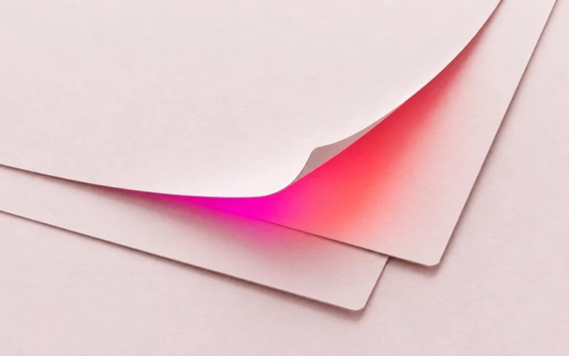 Layered paper panels with gradient light spilling from underneath